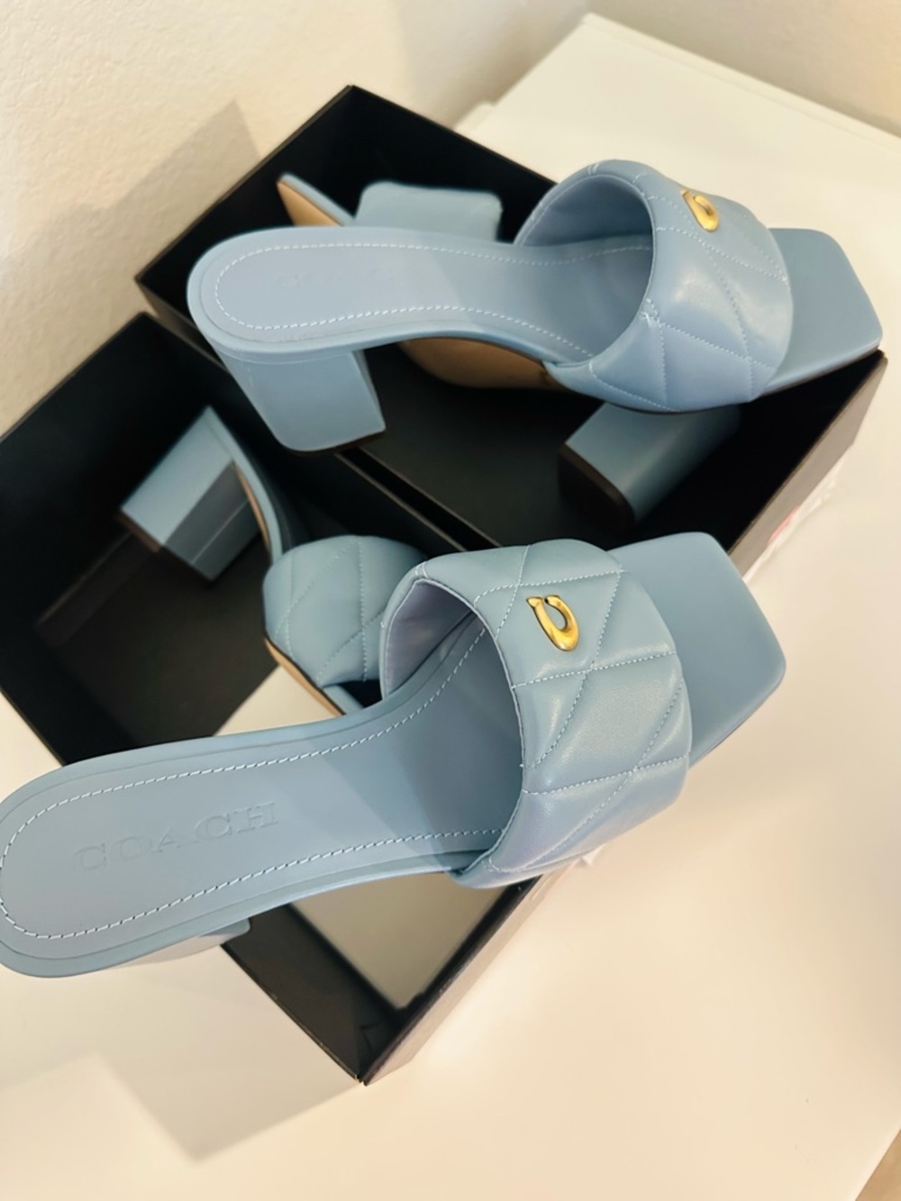 Coach Quilted Pale Blue Slide Sandals with Gold Accent